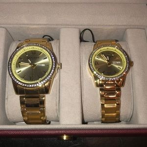 His and hers gold tone watches to swag out